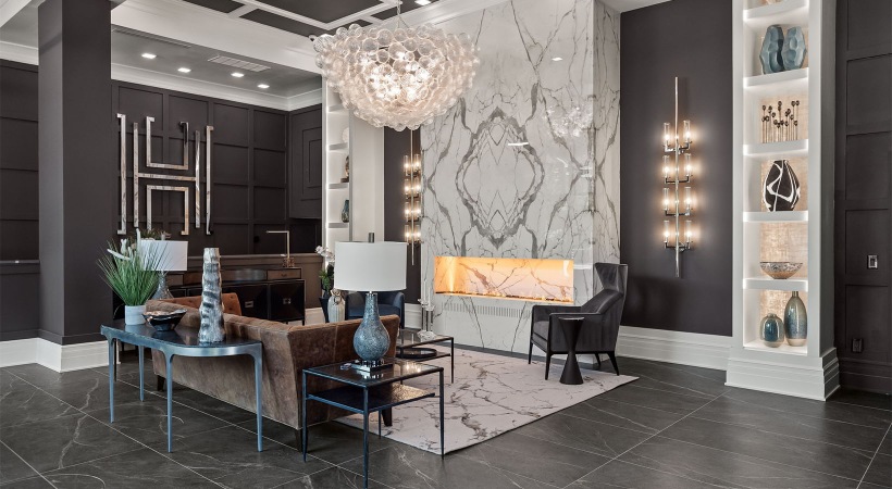 a lounge with a fireplace